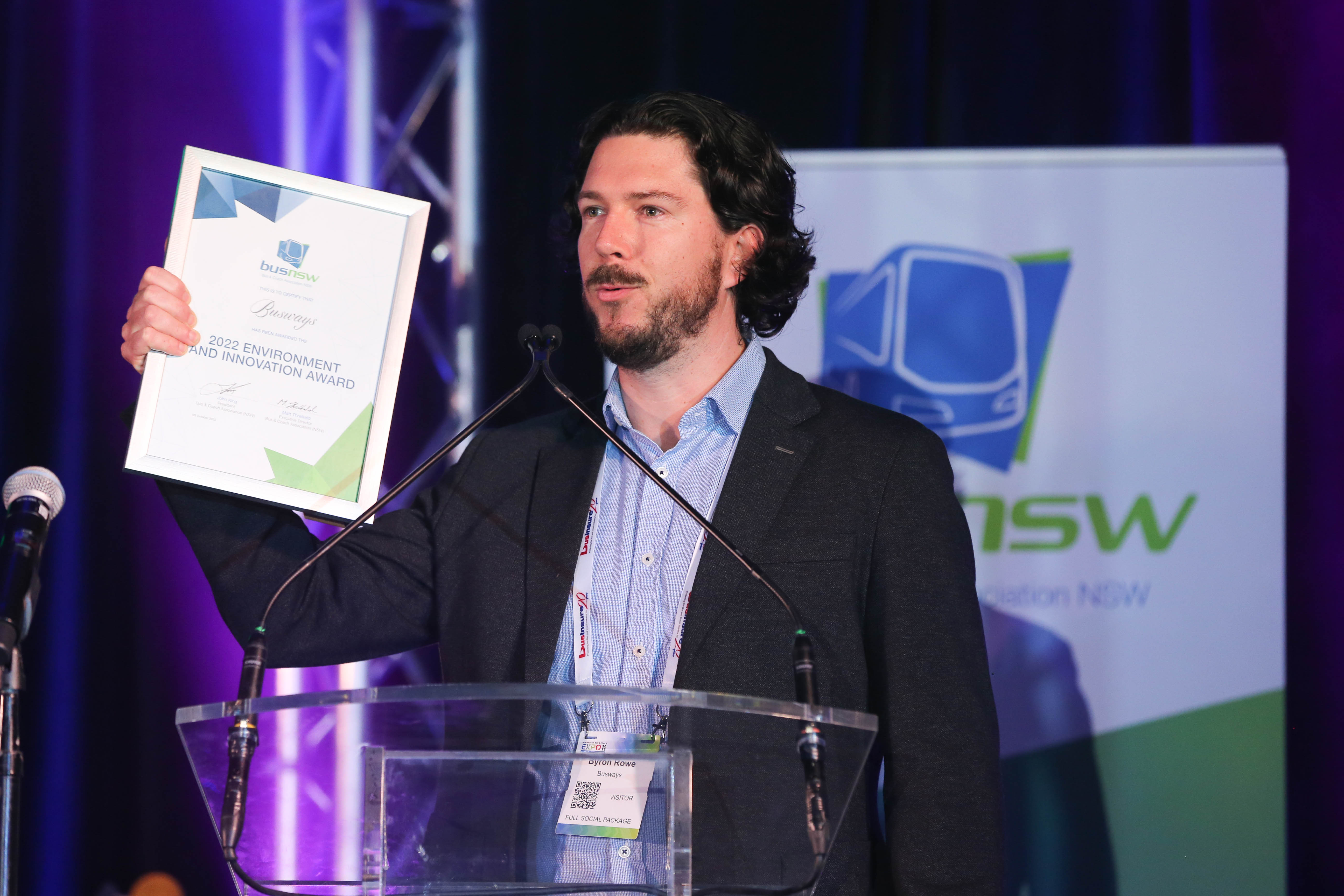 Busways Managing Director accepts the Award