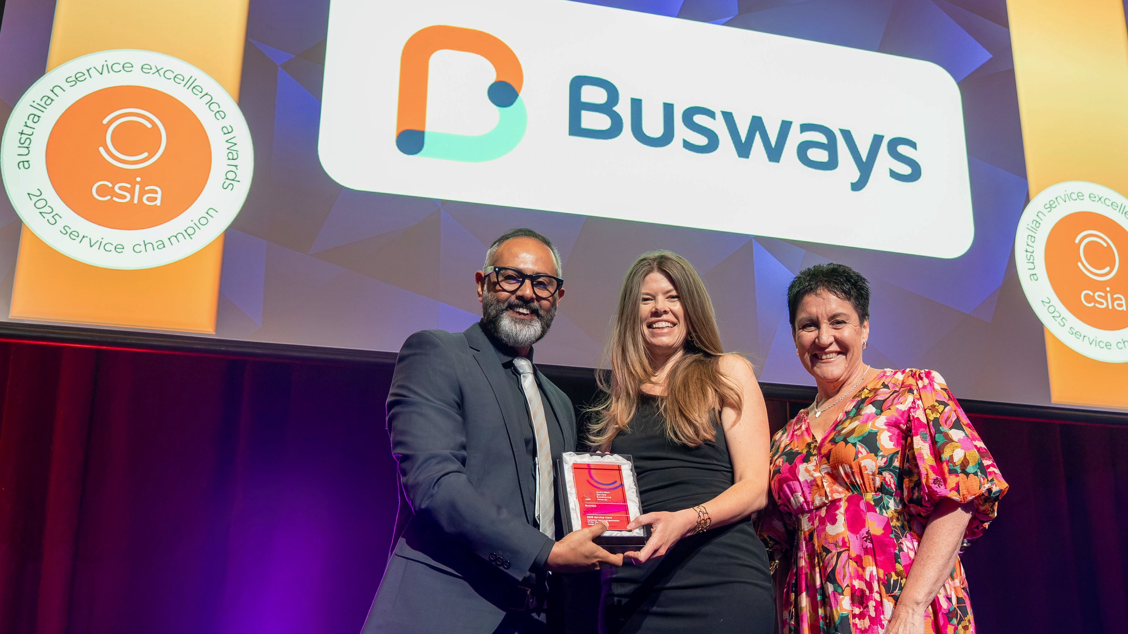Busways team accepting the CSIA award
