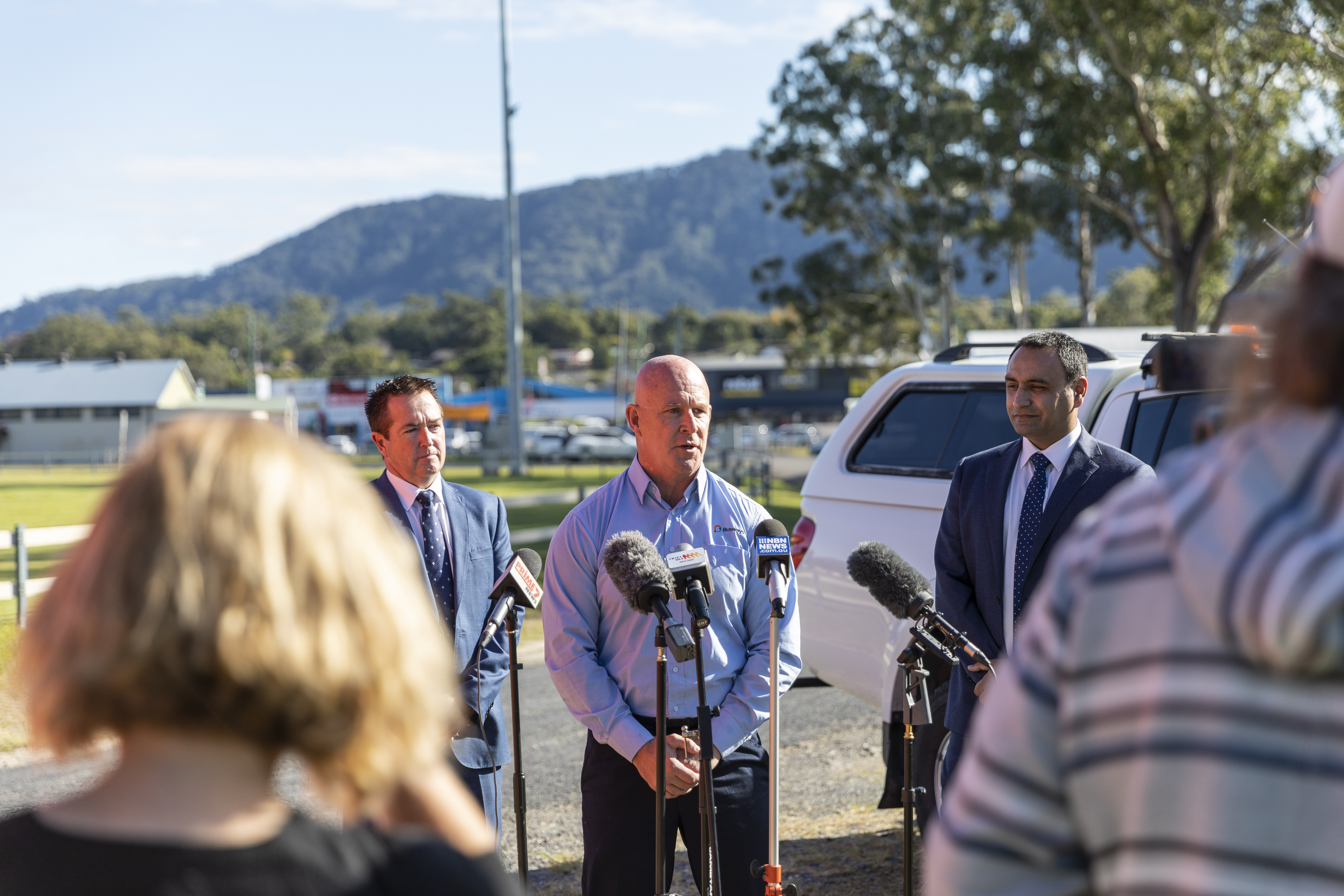 Busways Regional Operations Manager Mark Lawrence speaking Minister for Regional Transport and Roads Paul Toole and Member for Coffs Harbour Gurmesh Singh Coffs Harbour MP, Minister and Busways' Regional Operations Manager
