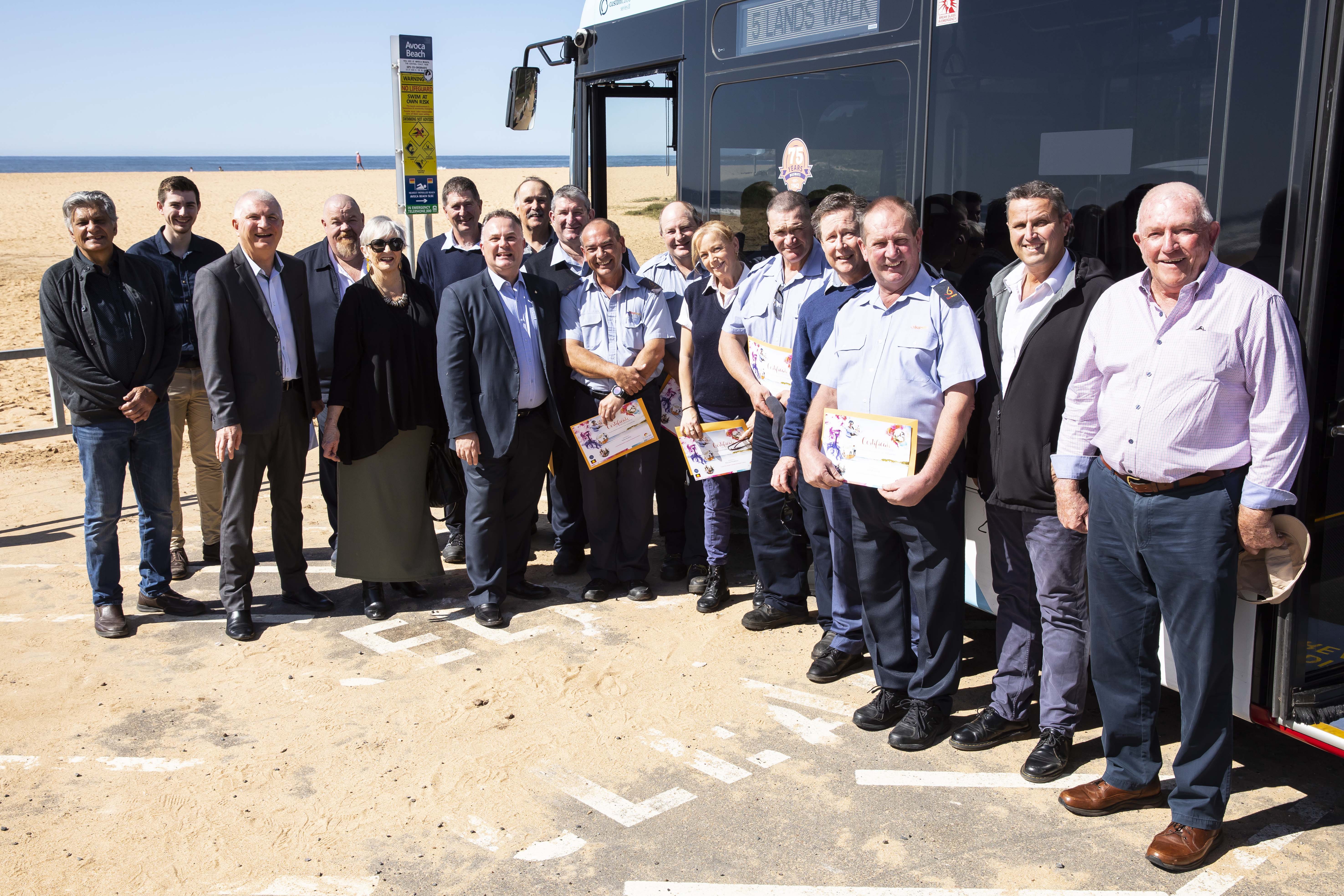 Busways employees with Adam Crouch.