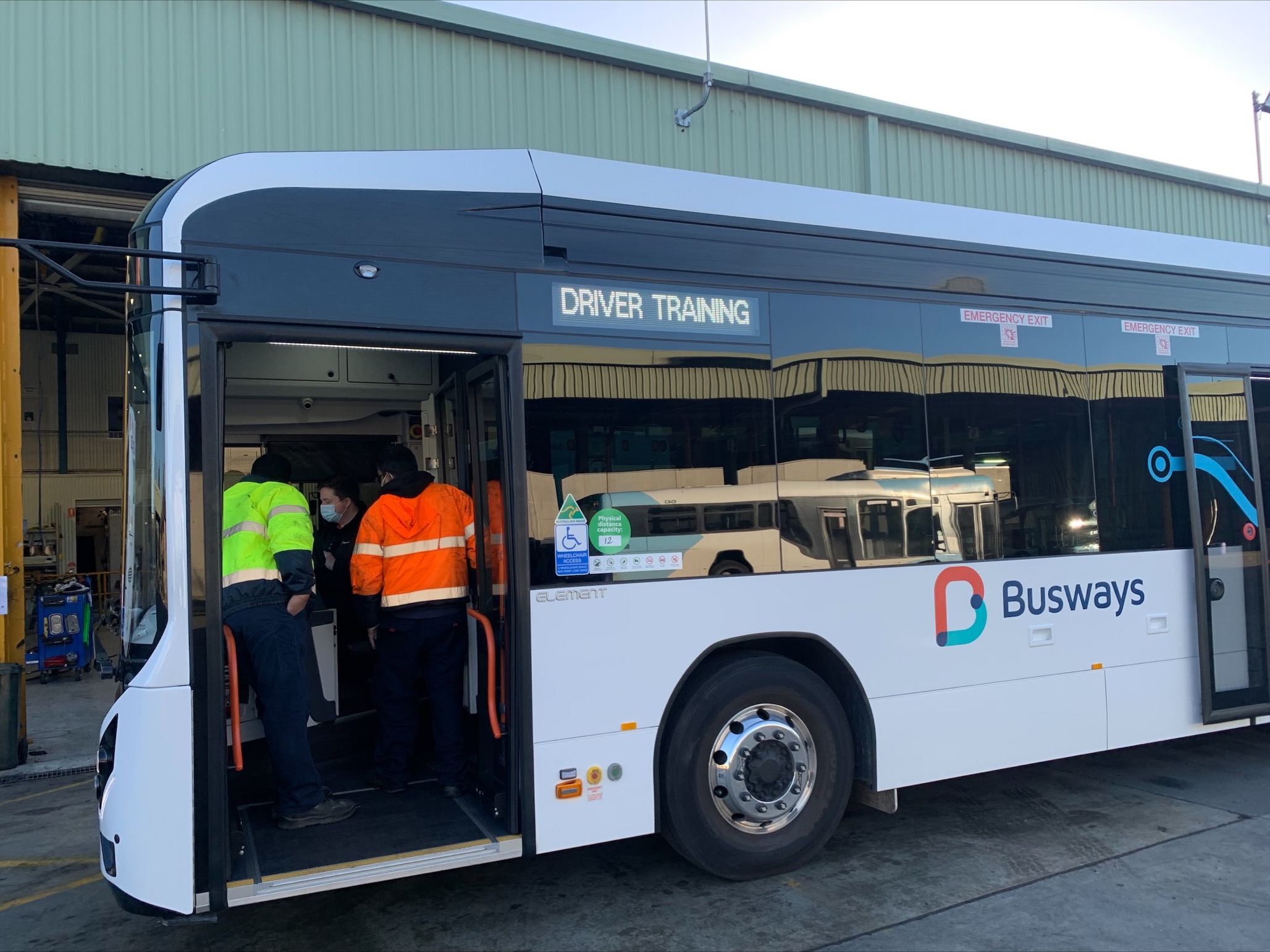Busways drivers learning about the electric bus