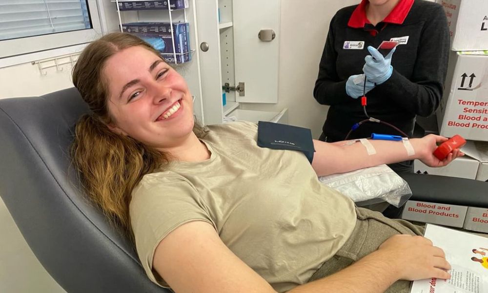 Busways employee giving blood