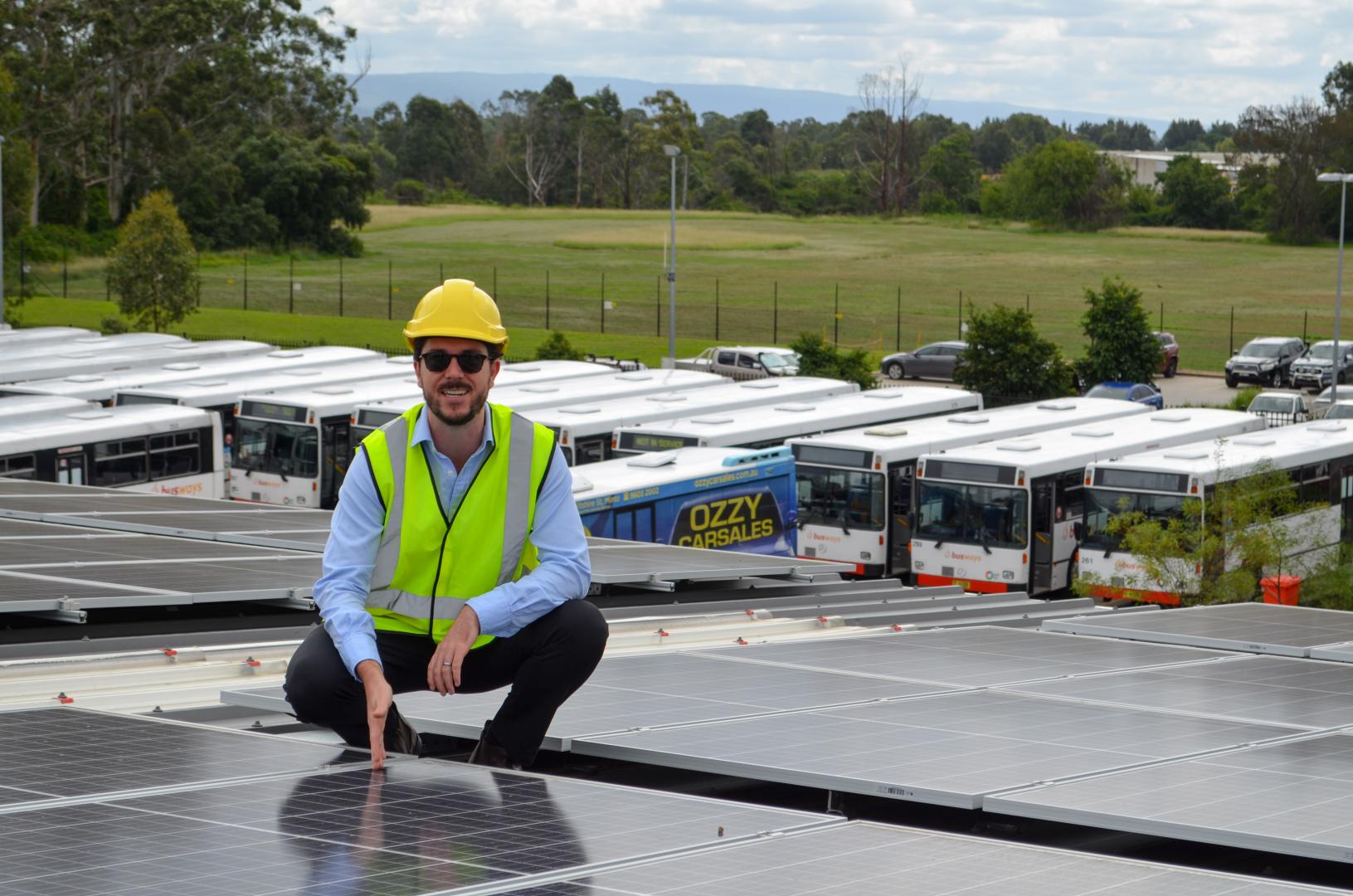 Byron Rowe with the solar panels