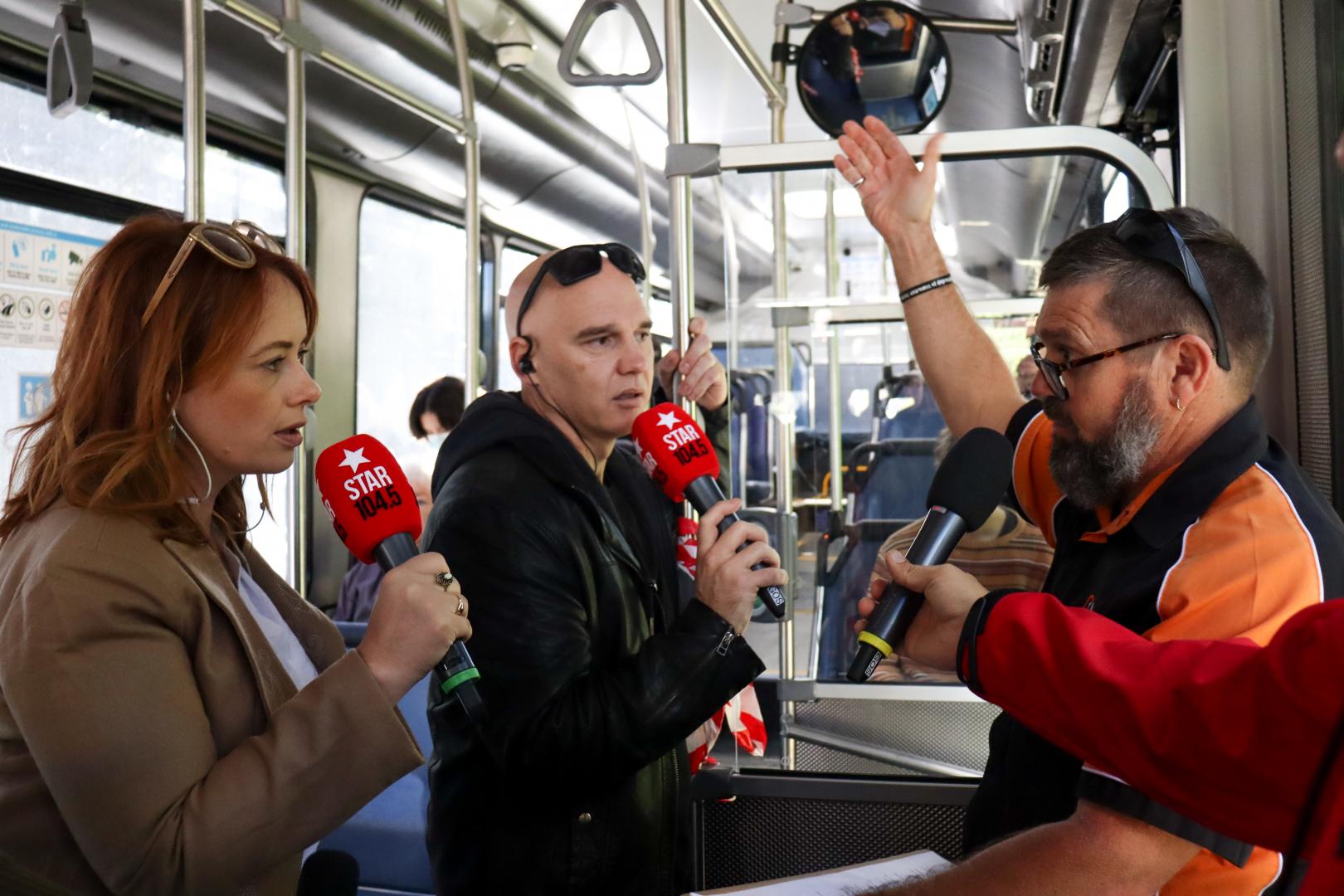 Rabbit and Sarah from 104.5 speaking with Busways Driver Trainer Andy about road safety around buses.