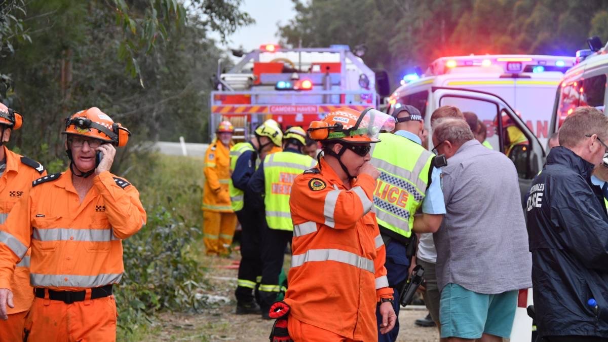 Paul Burg (centre) out on the job.