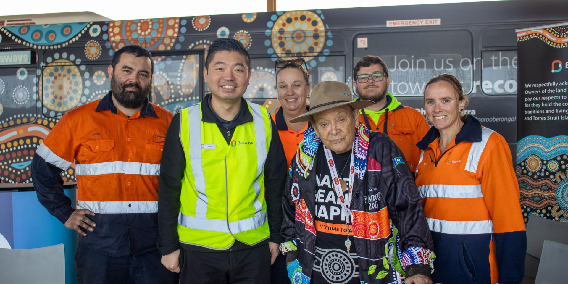 Busways employees smiling with uncle wes